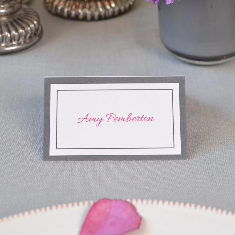 Farringdon Wedding Name Place cards printed with a grey border and your name personalised in shocking pink