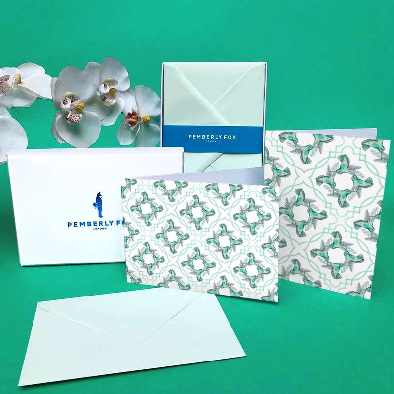 The green hummingbird greeting cards are folded, blank on the inside and come with matching green envelopes