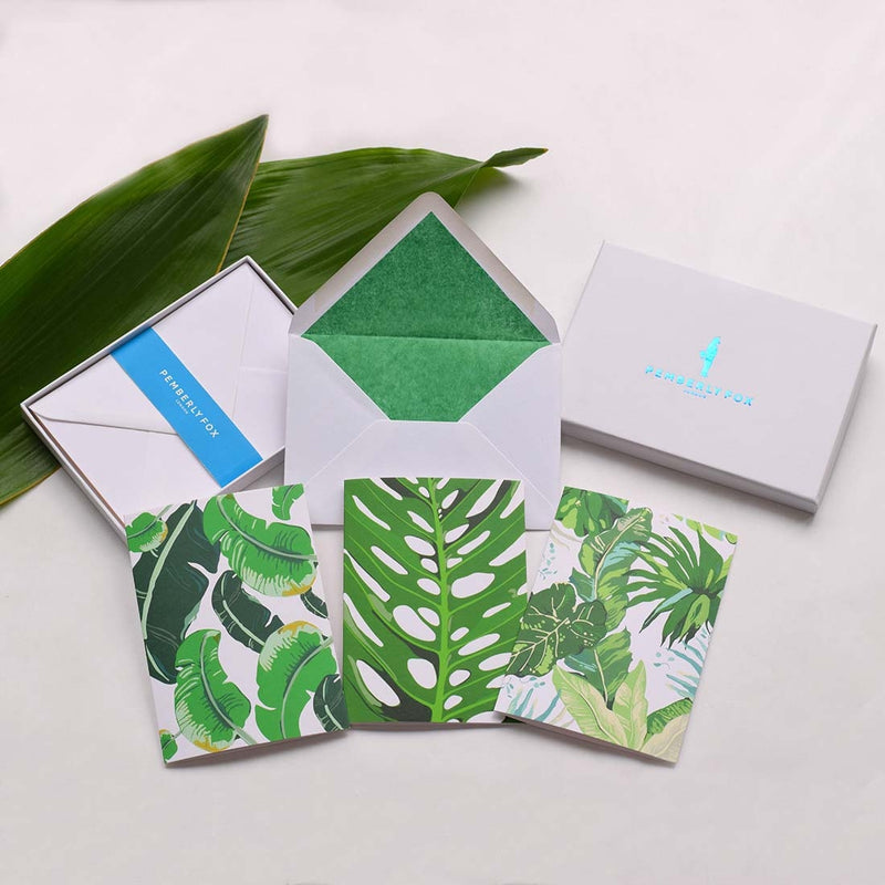 the jungle mania greeting cards shows thee leaf patterns with matching green tissue lined white envelopes
