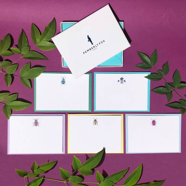 The love bugs shown here with each motif card in the pack place on their corresponding range of coloured envelopes
