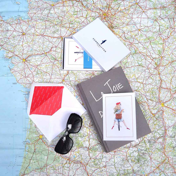 the margaux on her bike greeting cards with white envelopes with red printed paper lining sold in branded boxes