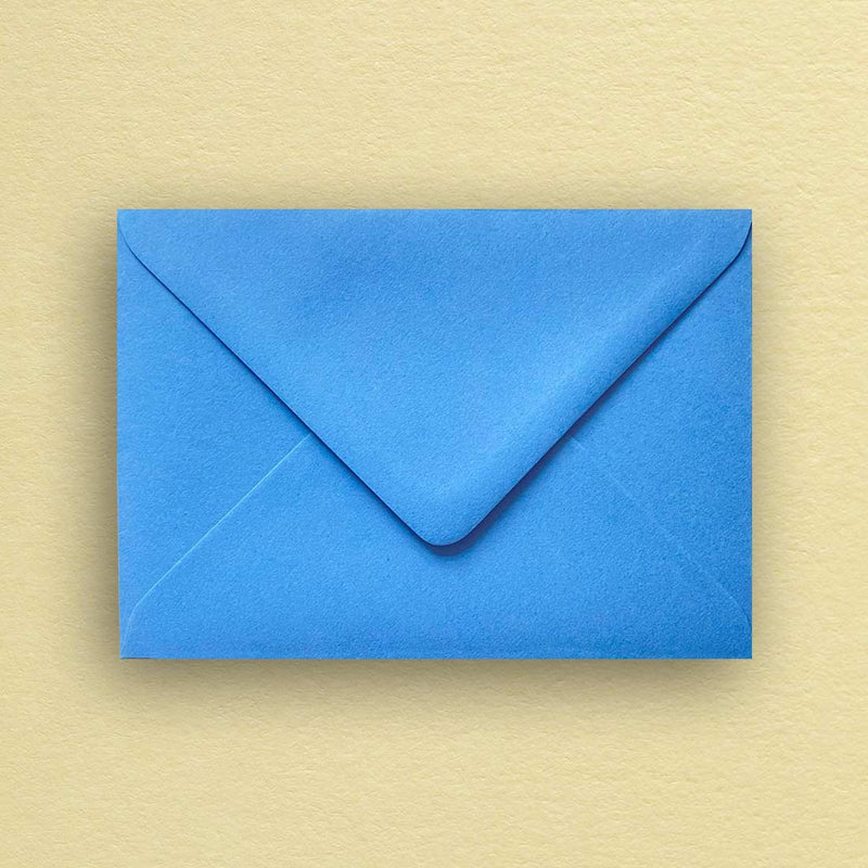 A stunning shade of Colorplan new blue 135gsm paper has been used to make up these diamond flap C6 envelopes
