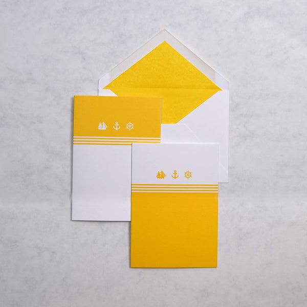 the yellow and white Palma nautical greeting cards show 3 nautical motifs on portrait cards, with matching yellow tissue paper lined white envelopes