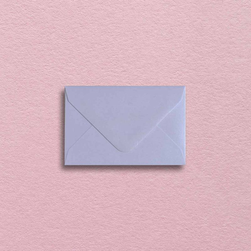 Delivering a pearlescent effect, these white envelopes come with diamond flaps 