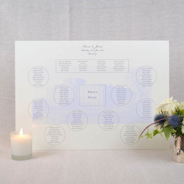 The Pemberly seating plan uses an image of the wedding venue as a background tint. The guests names are grouped according to their table position