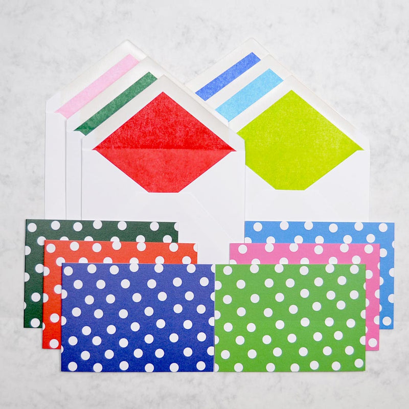 the polka straight greeting cards show 6 colour ways of a polka dot pattern on landscape cards, with matching tissue paper lined white envelopes