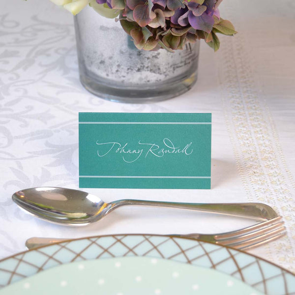 The Portland wedding name place cards are printed with your name reversed out of a solid colour