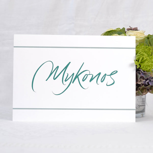 The Portland wedding table name cards print on a pristine white 350gsm A4 card with double keylines above and below the name