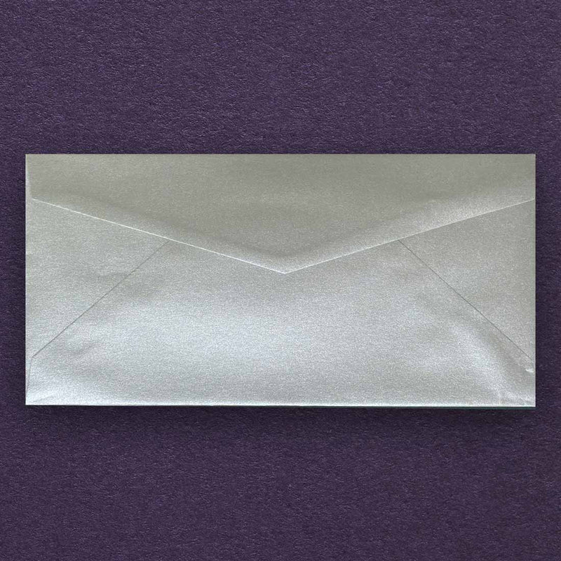 shimmering silver dl envelopes made using peregrina pearlescent paper