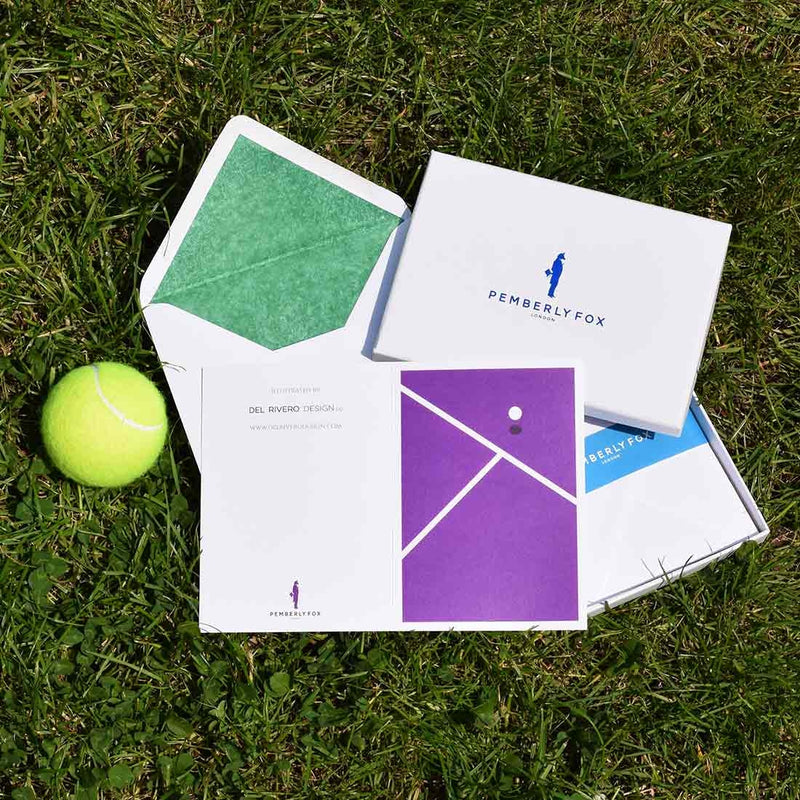 the SW19 greeting cards shown in their white envelopes which are lined with contrasting forest green tissue paper