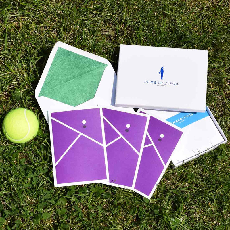 the SW19 greeting cards show a modern take on tennis using Wimbledon's trademark purple, sold with forest green tissue paper lined white envelopes