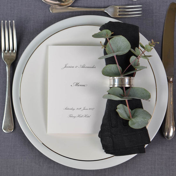 The Tilney wedding menu offers a classic format in a folded card, printed both sides, presented here on a silver rimmed dish.