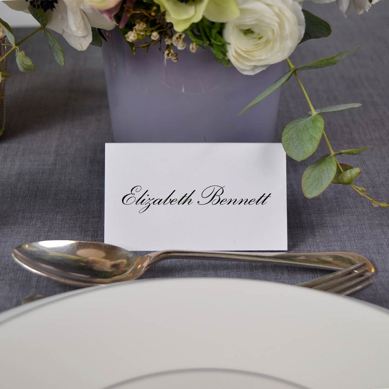 A classic font shows your guests names on the tilney wedding place cards