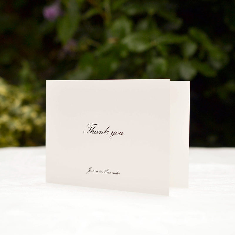 The Tilney wedding thank you cards are printed on the front page of the folded off-white card with the word 'Thank You'