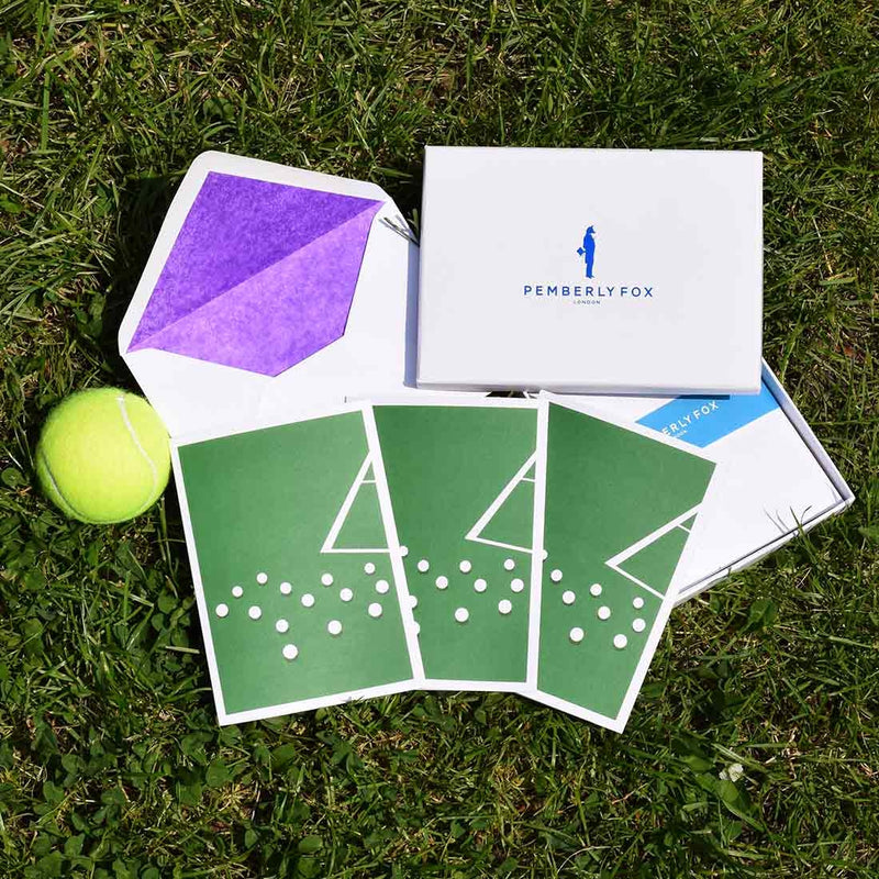 he Wimbledon greeting cards show a modern take on tennis using Wimbledon's trademark dark green, sold with purple tissue paper lined white envelopes